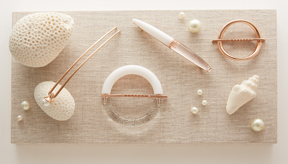 Clear and water inspired Lucite accessories that add cool to any hairstyle.