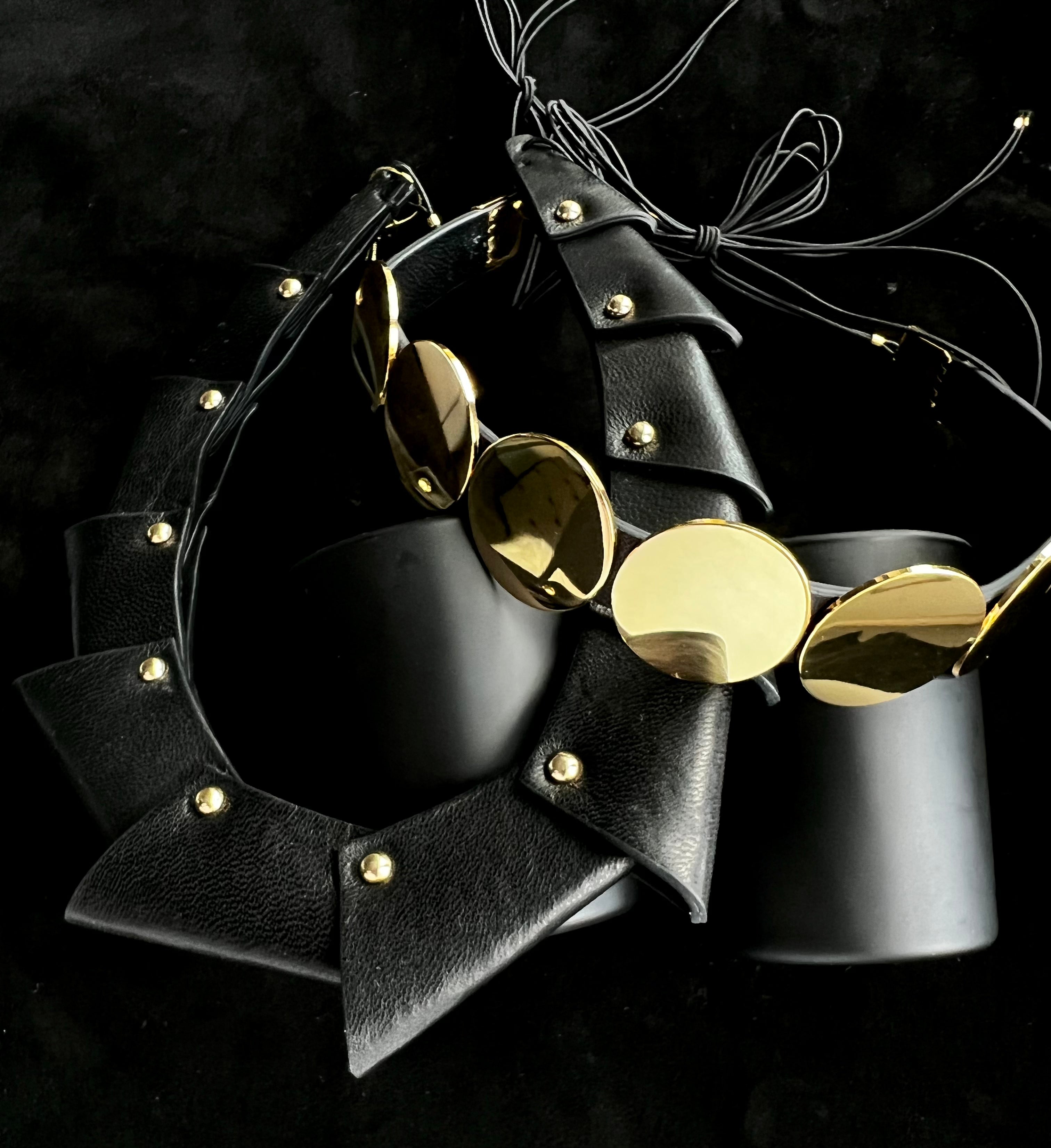 Black hairpins, jaw clip and bangle on black